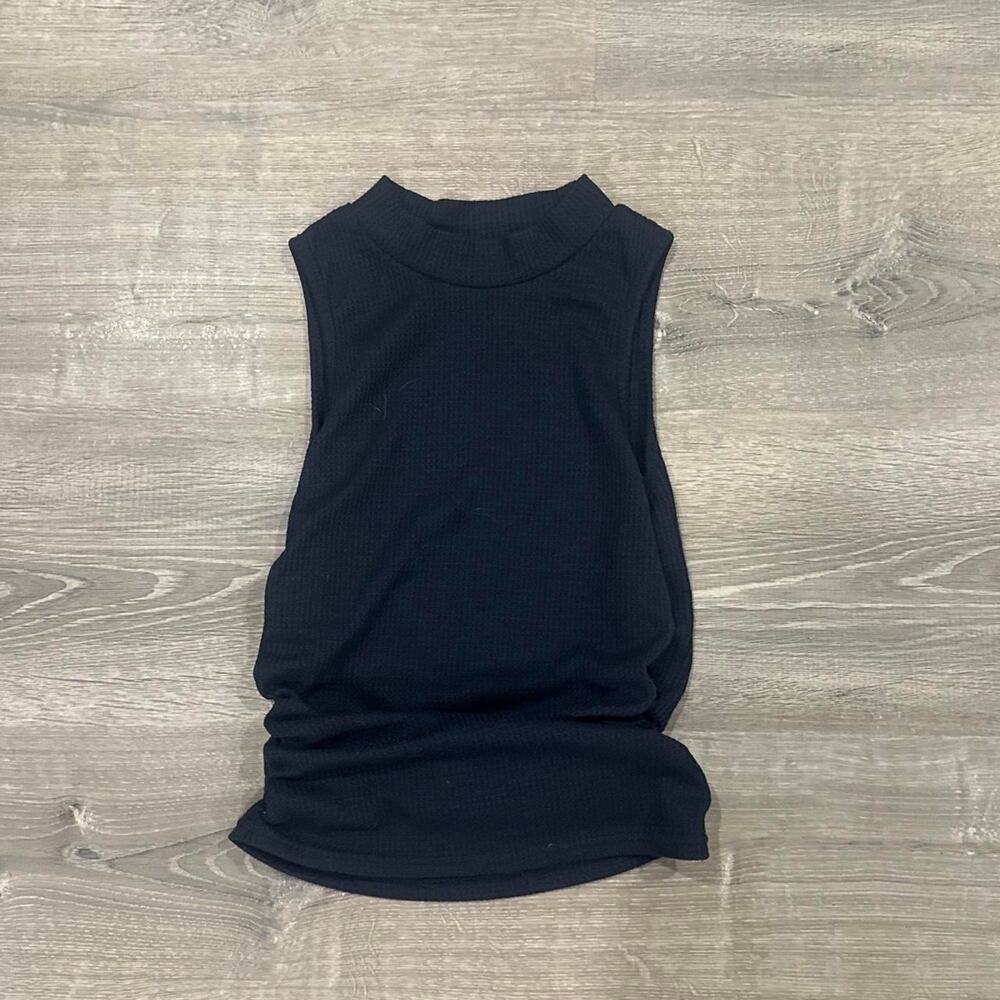 Black sleeveless top with rouched